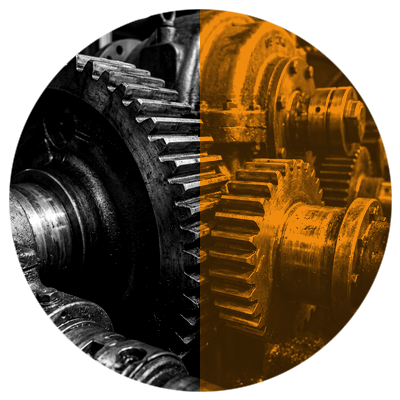 Reliability - Precision interlocking steel gears on amber split circle